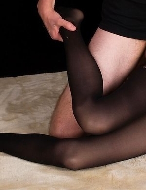 Black pantyhose babe Ayaka Mikami gets her feet and legs fucked on the floor