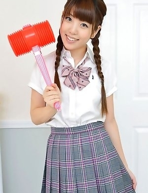 Mizuho Shiraishi with uniform and pigtails plays like child