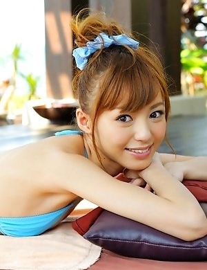 Aino Kishi in blue bath suit is a true beauty enjoying sand