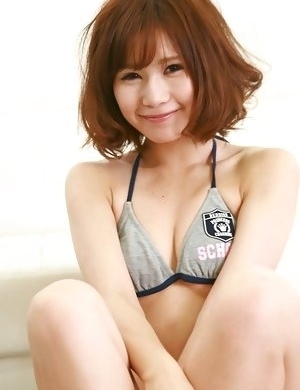 Ai Kumano in bath suit moves with hot gestures on floor